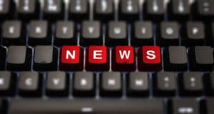 red keyboard keys highlighted to read "news"